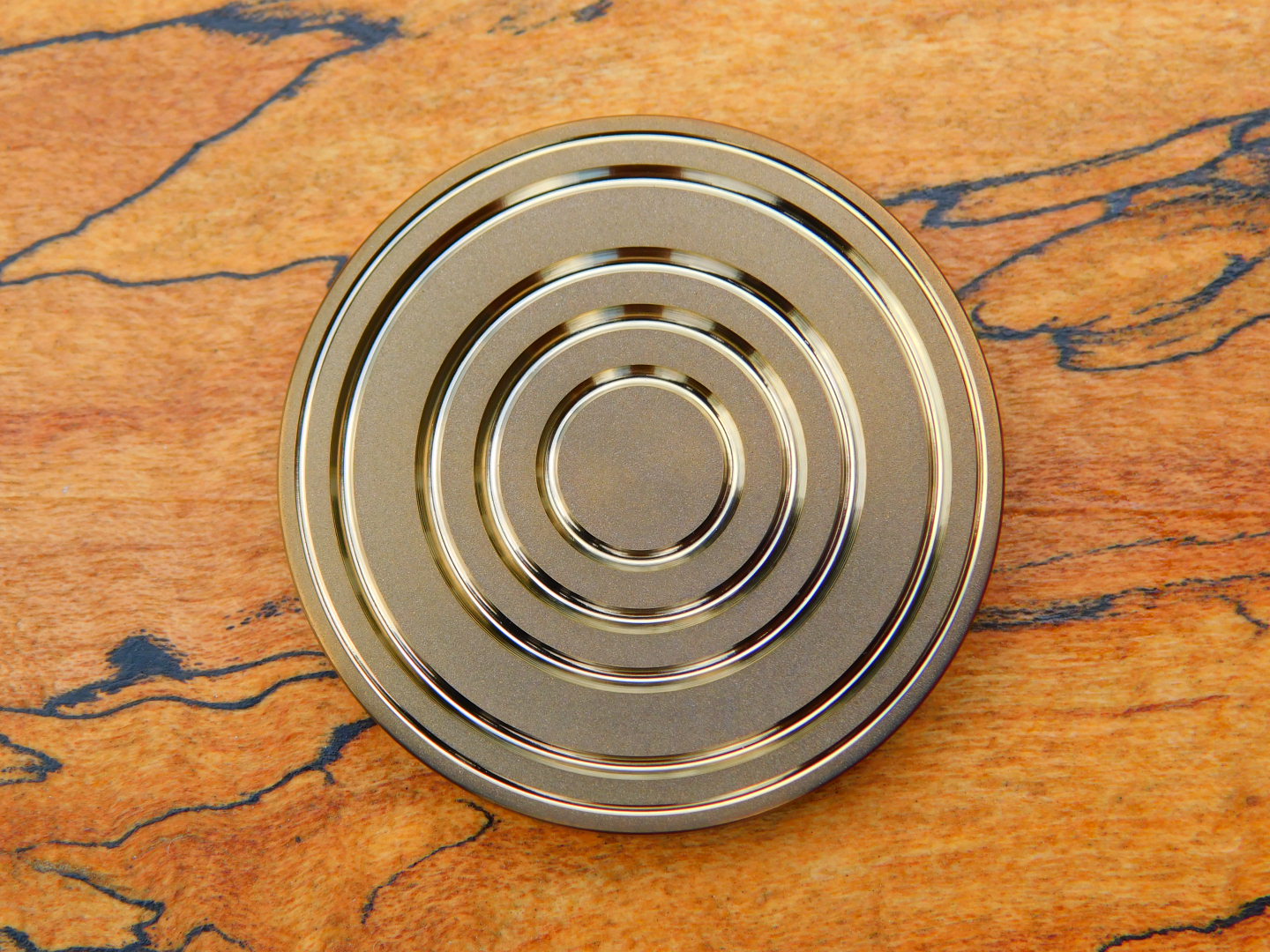 Bronzed Titanium x Fordite Coin