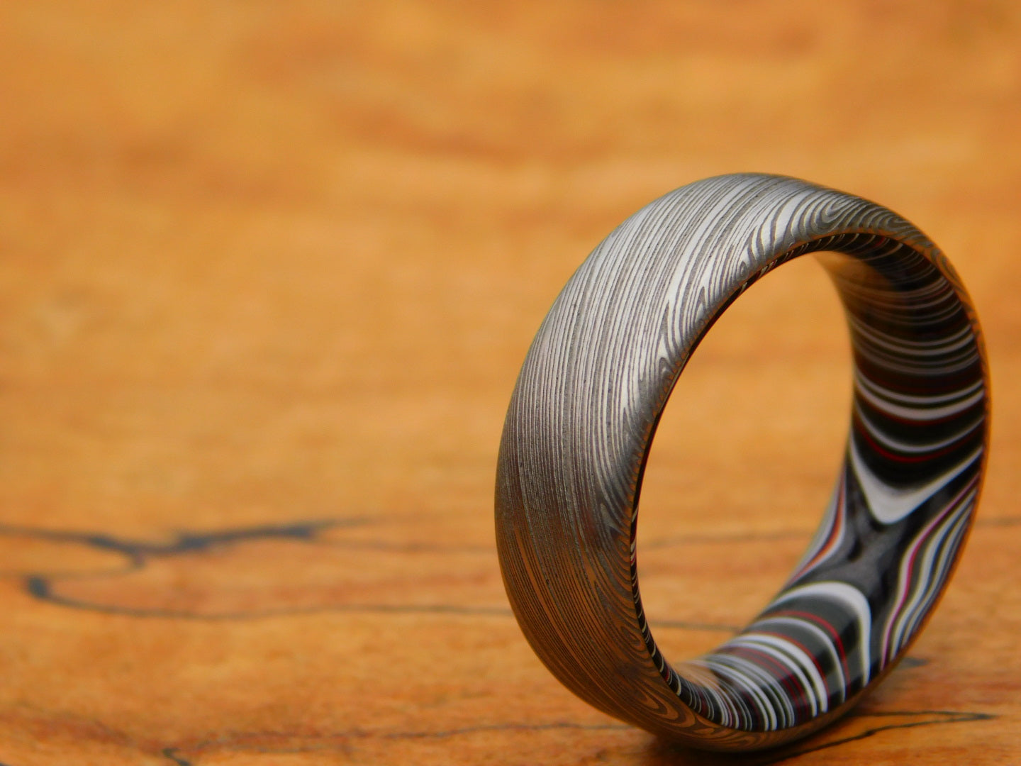 Heimskringla Stainless Damascus x Crosscut Fordite Ring