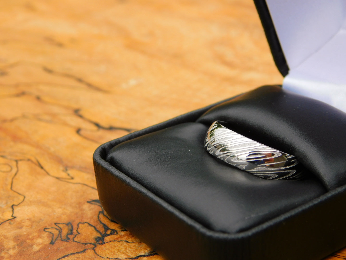 Polished Saga Stainless Damascus Ring