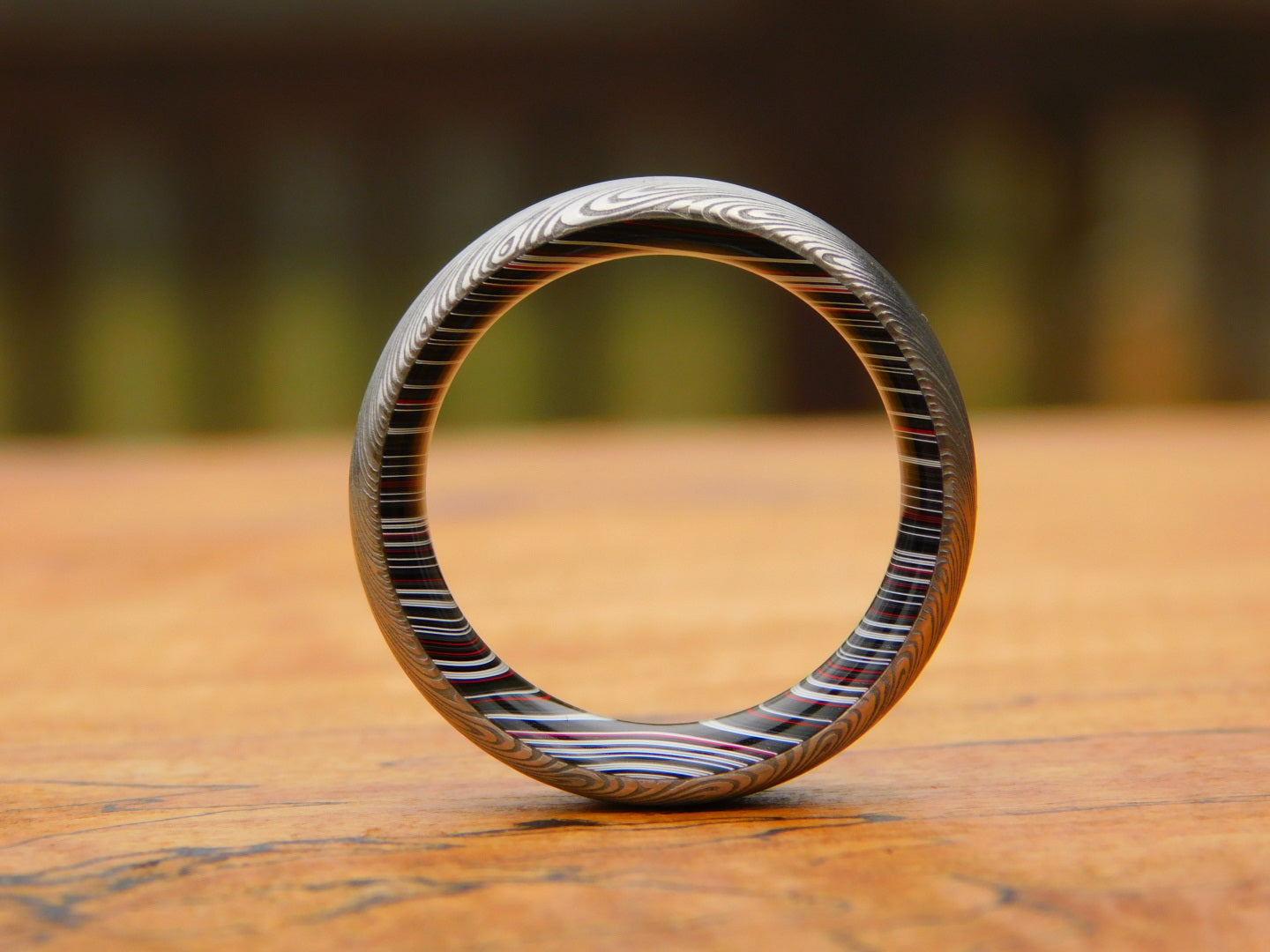 Heimskringla Stainless Damascus x Crosscut Fordite Ring