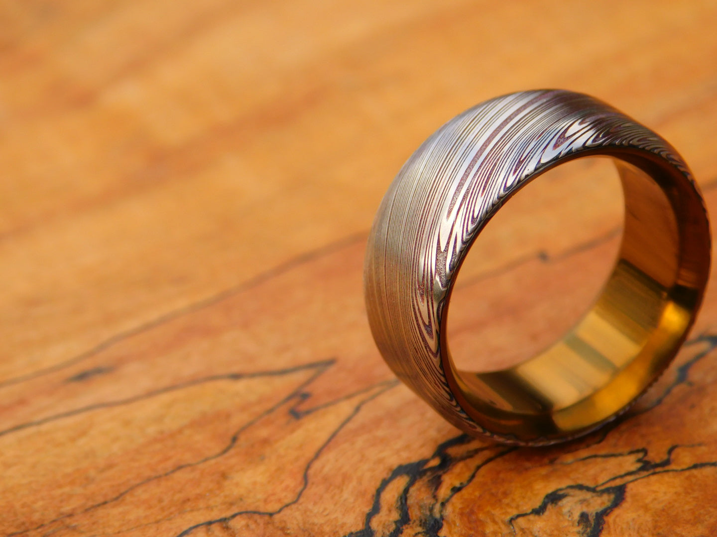 Heimskringla Damasteel x Flamed Titanium Ring