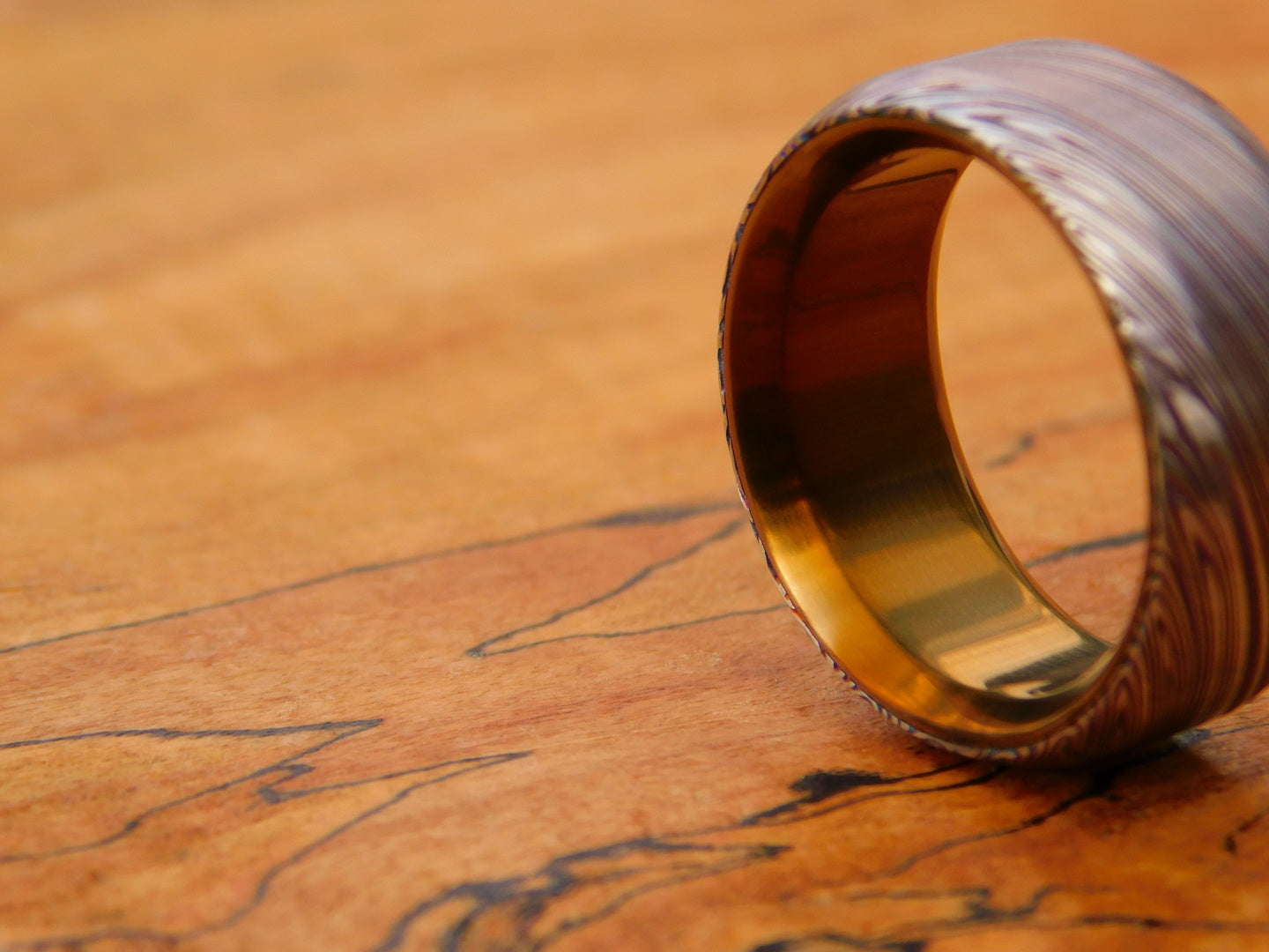 Heimskringla Damasteel x Flamed Titanium Ring