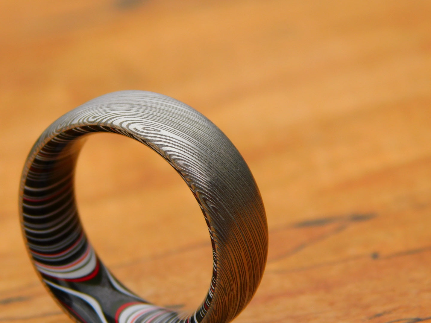 Heimskringla Stainless Damascus x Crosscut Fordite Ring