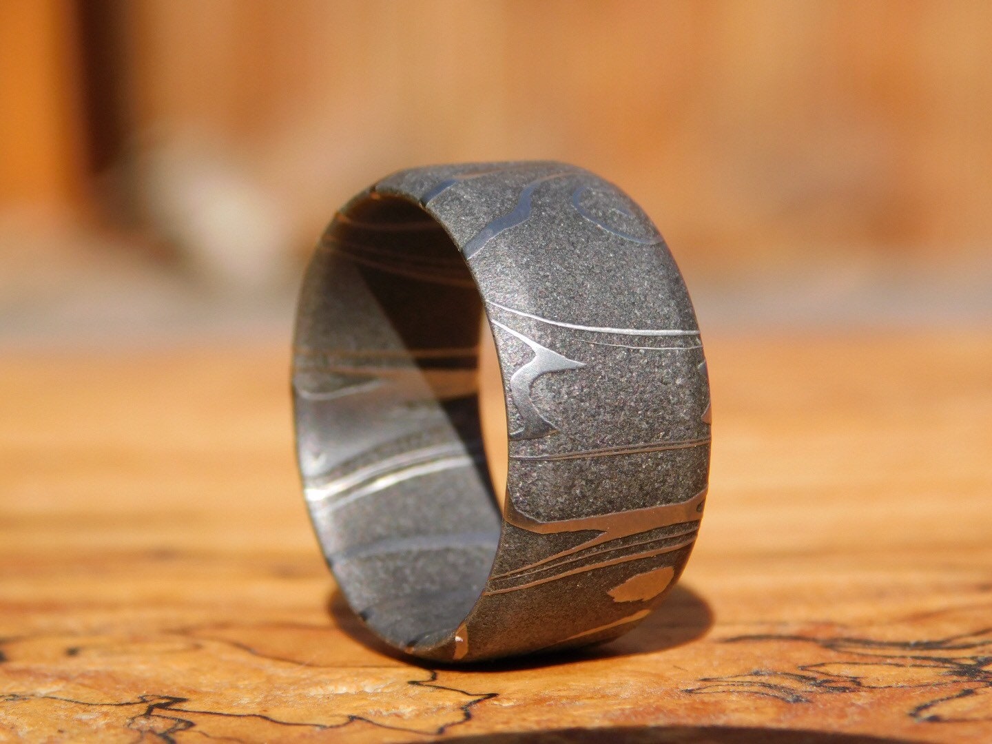 Petroglyph Carbon Damascus Ring