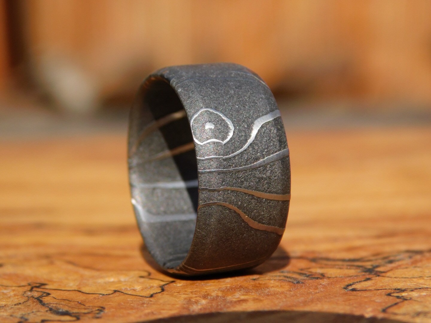 Petroglyph Carbon Damascus Ring