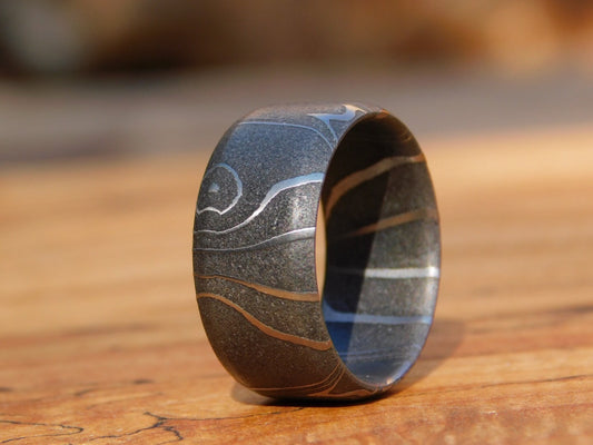 Petroglyph Carbon Damascus Ring