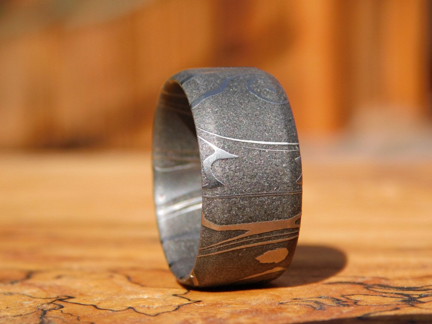 Petroglyph Carbon Damascus Ring